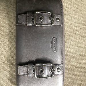 Coach platinum wallet, light use, looks good!